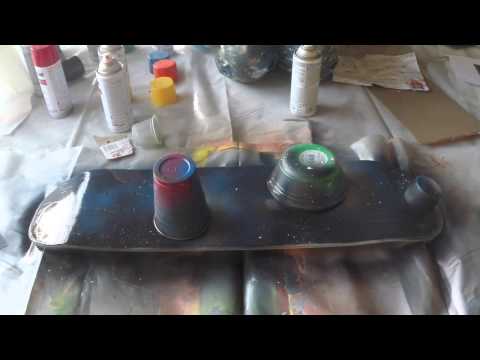 How to art spray paint planets on a used skateboard