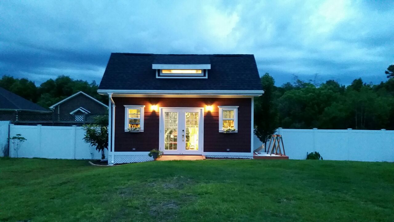 IMG-20150609-WA0009Storage building before porch.jpg