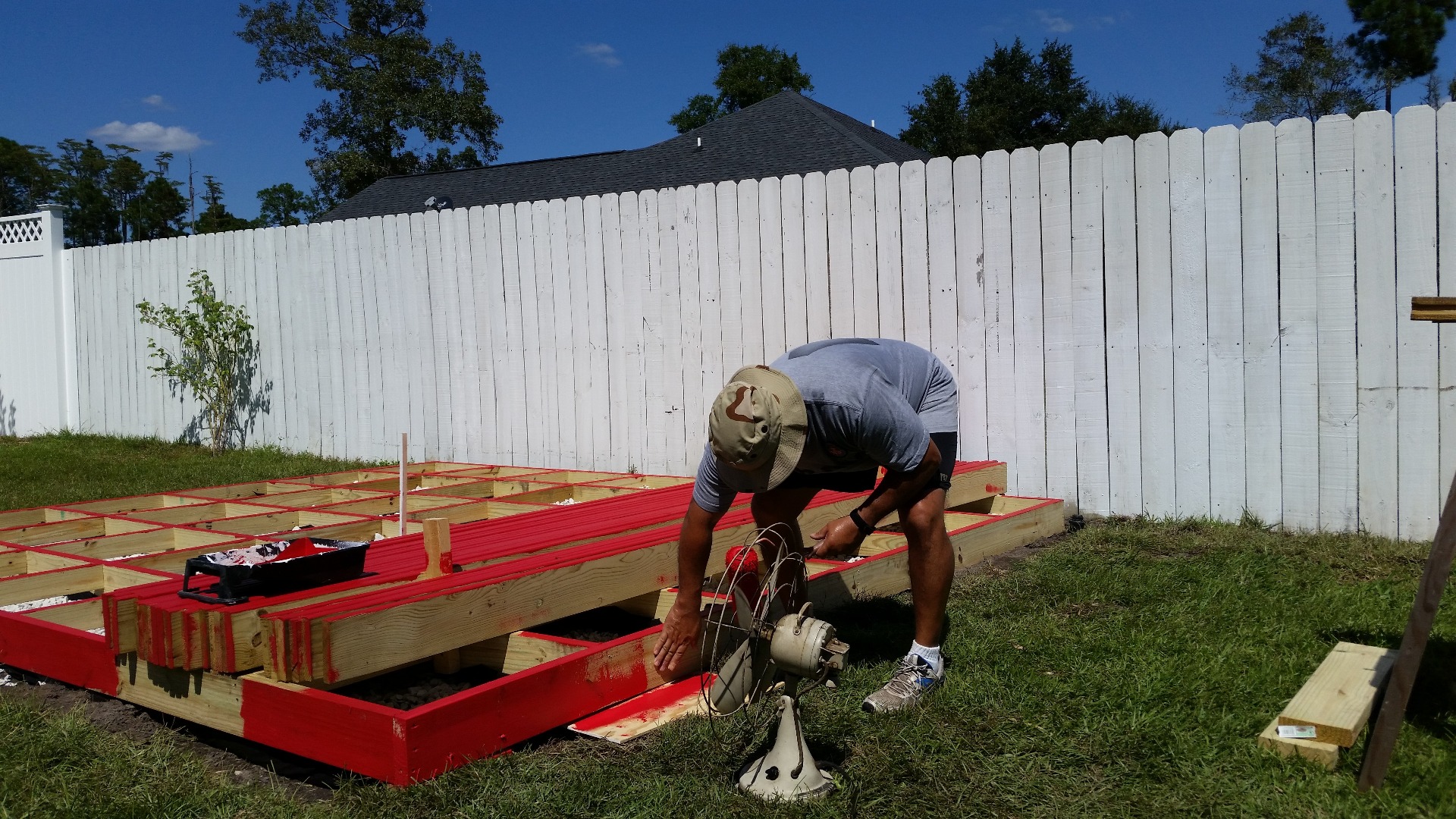 IMG-20150914 painting outside edge of deck 1.jpg