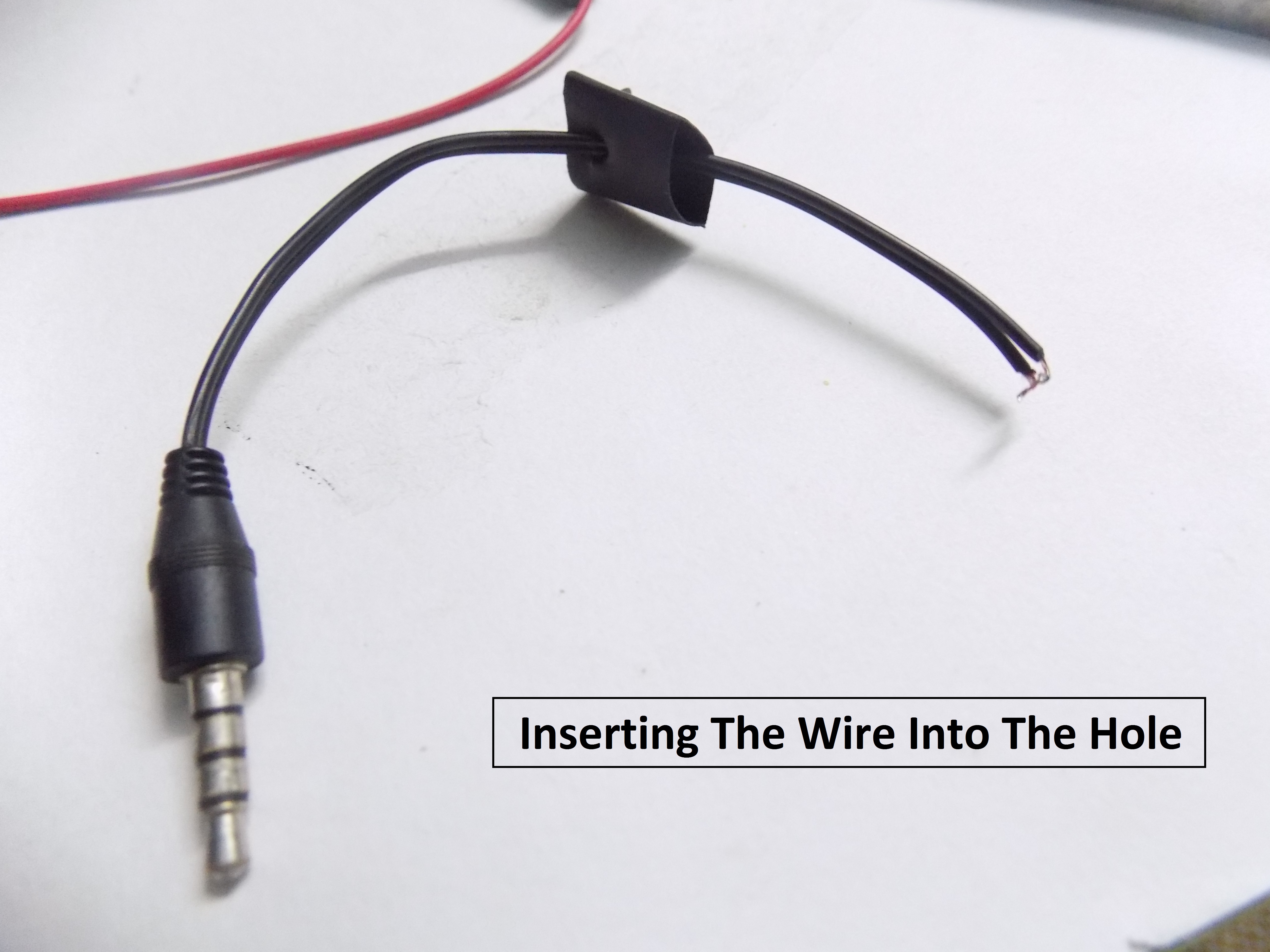 Inserting The Wire Into The Hole.JPG