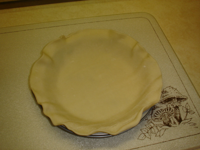 J  place unbaked crust into pie pan.JPG