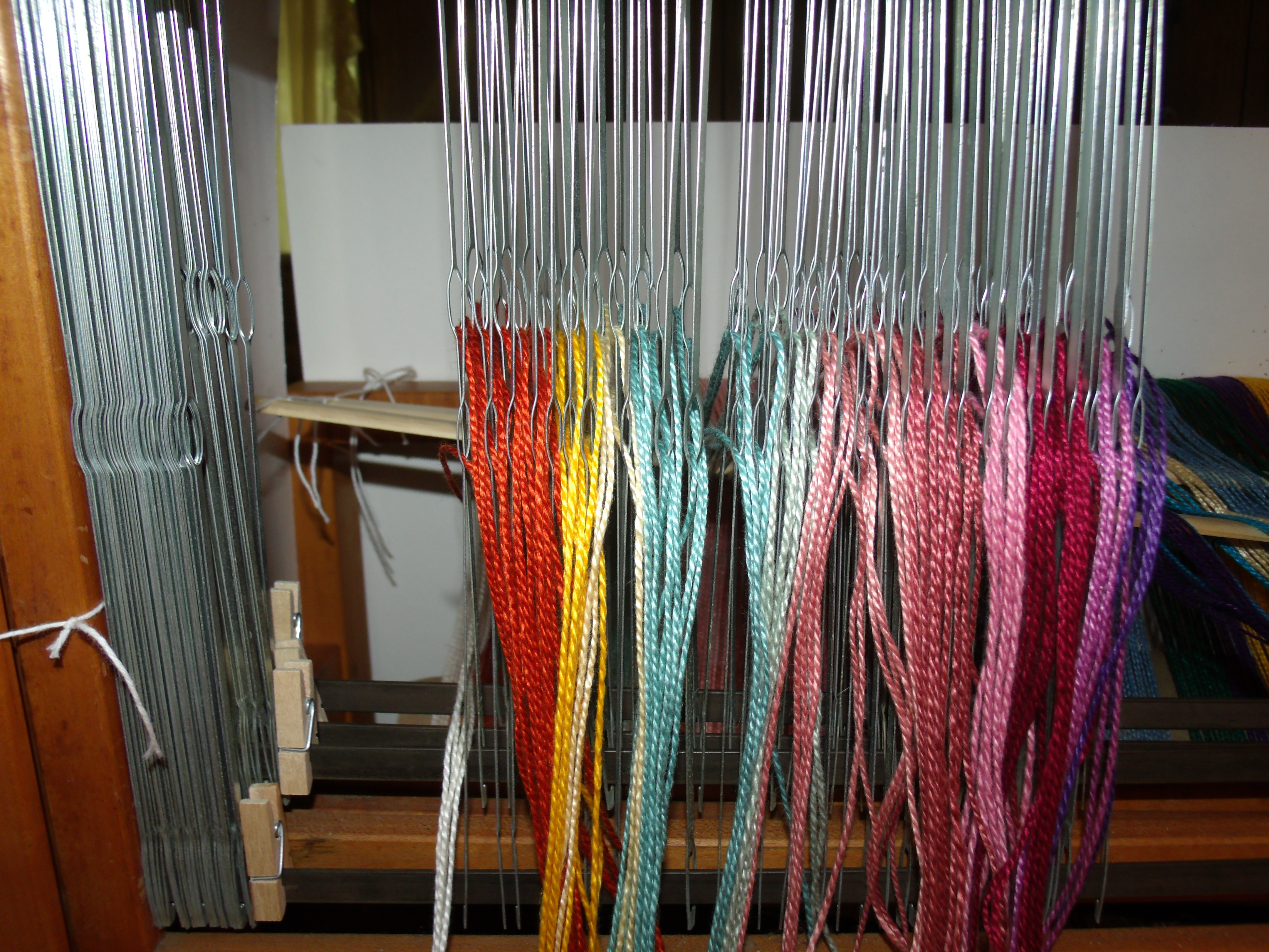 Left half of heddles threaded.JPG