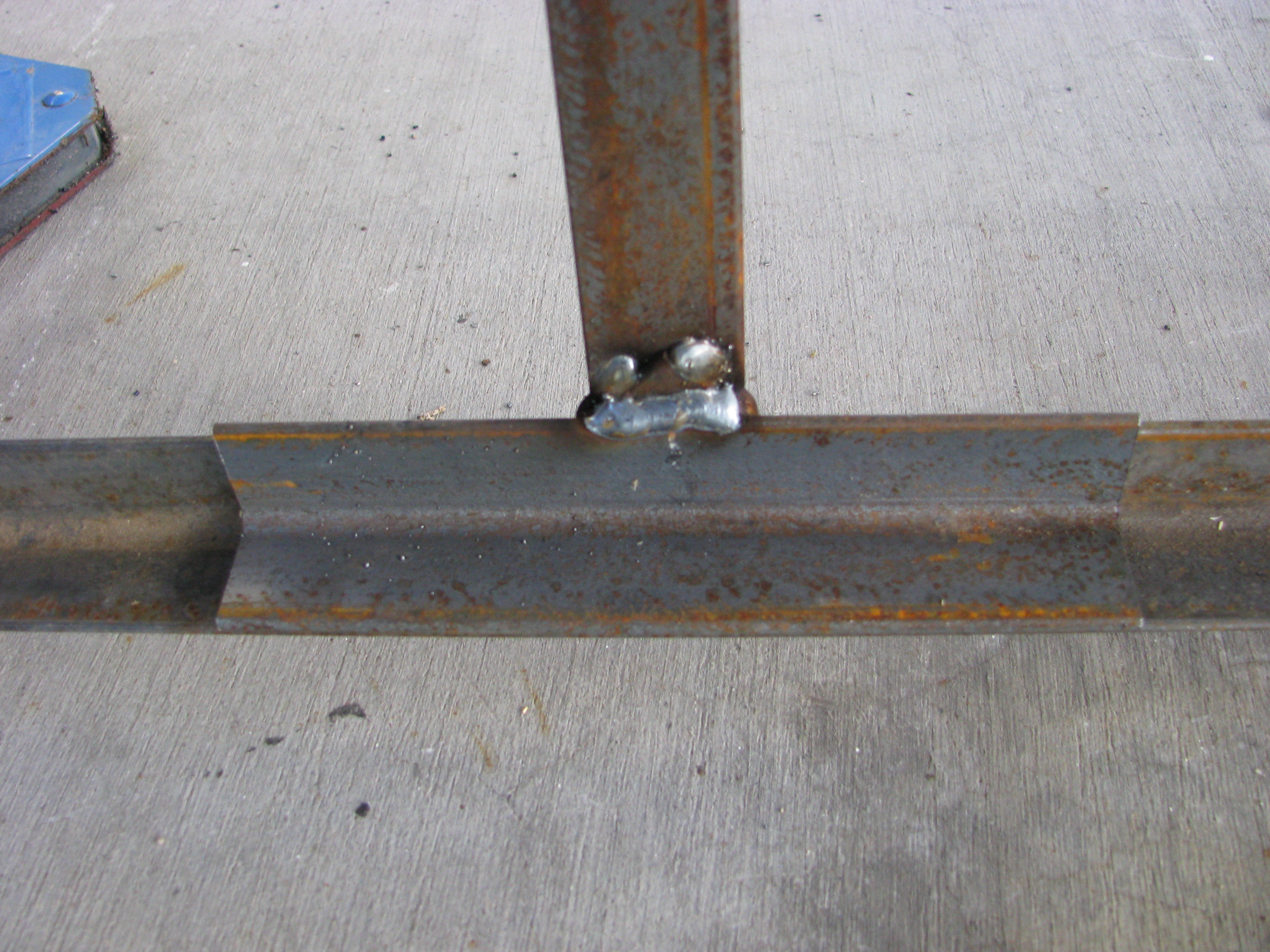 Light bracket retainer welded.JPG