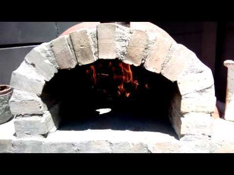 Lighting a fire in a Pizza Oven