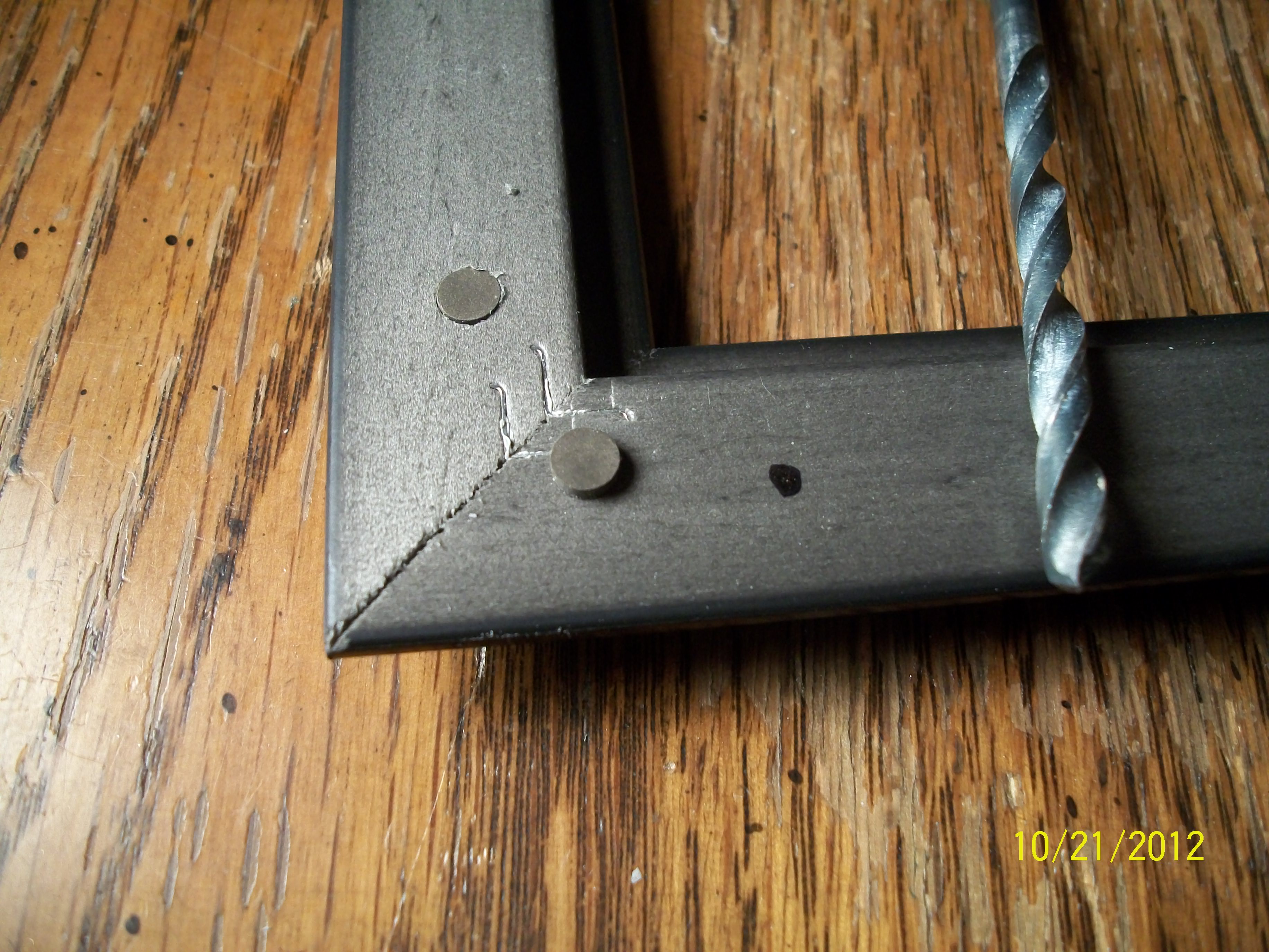 Magnets and drill bit.JPG