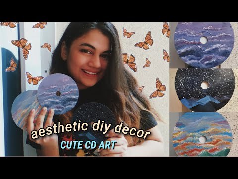 Old CDs to Aesthetic DIY Decor (painting sky variations on cd)