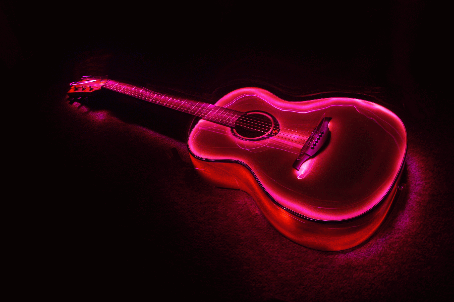 PHOTOGRAPHYMYSTERIES LIGHT PAINTING GUITAR RED.gif