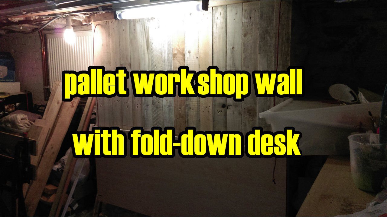 Pallet work wall with folding desk.png