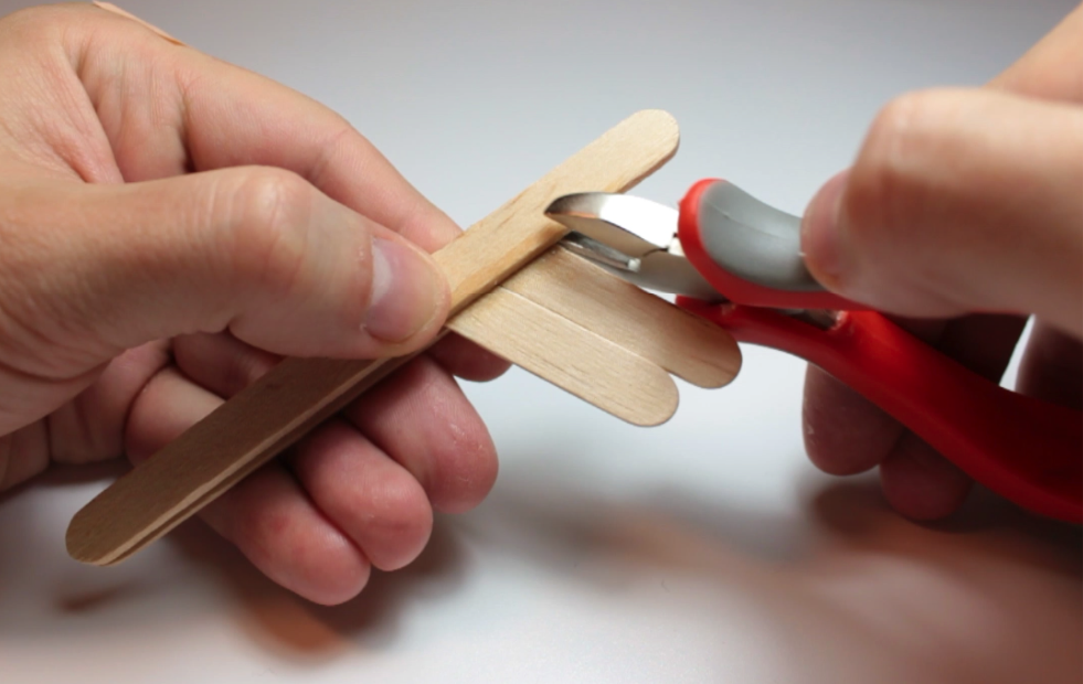 Pistola de palitos de madera.png