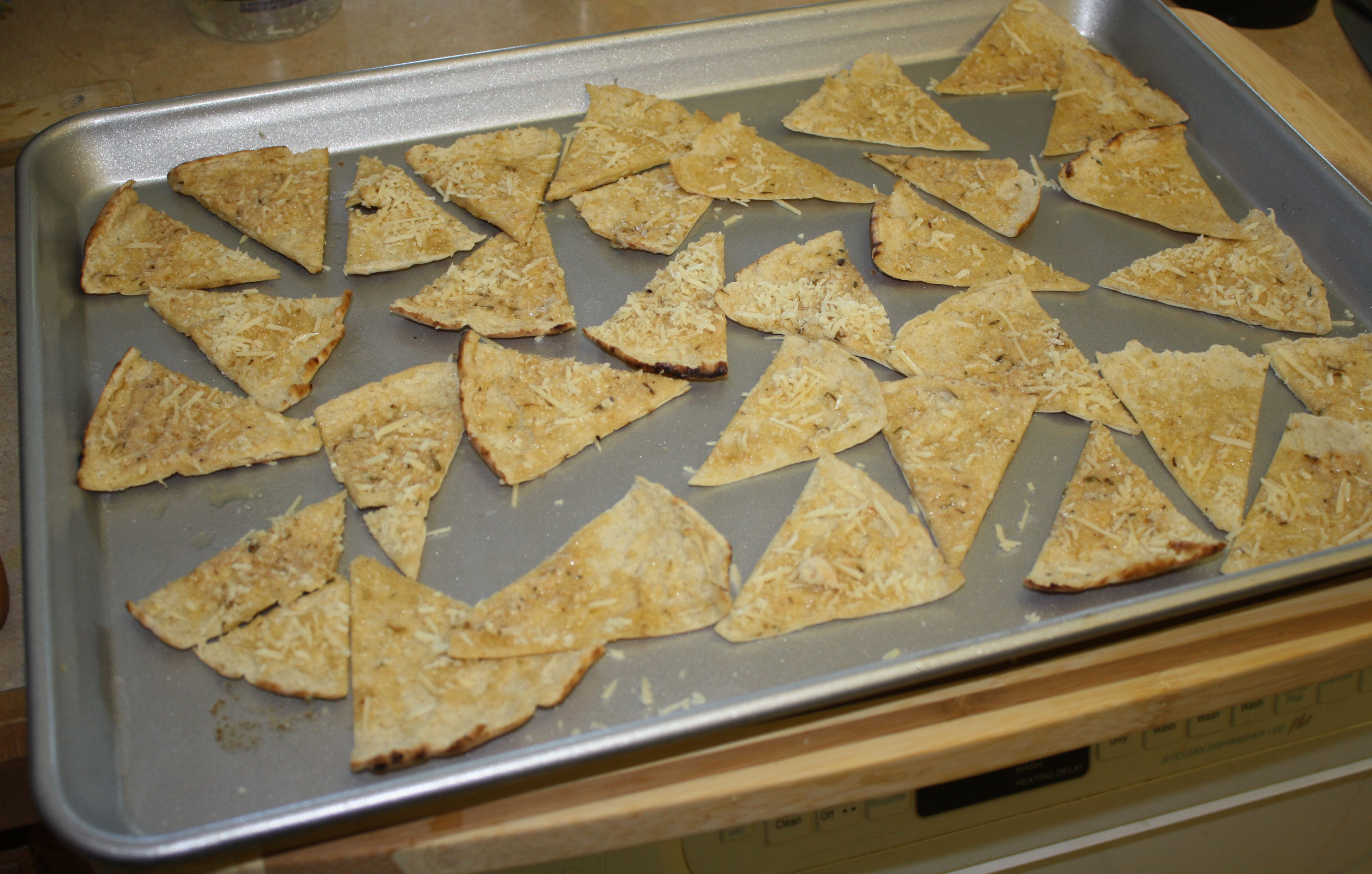 Pita on baking sheet.jpg