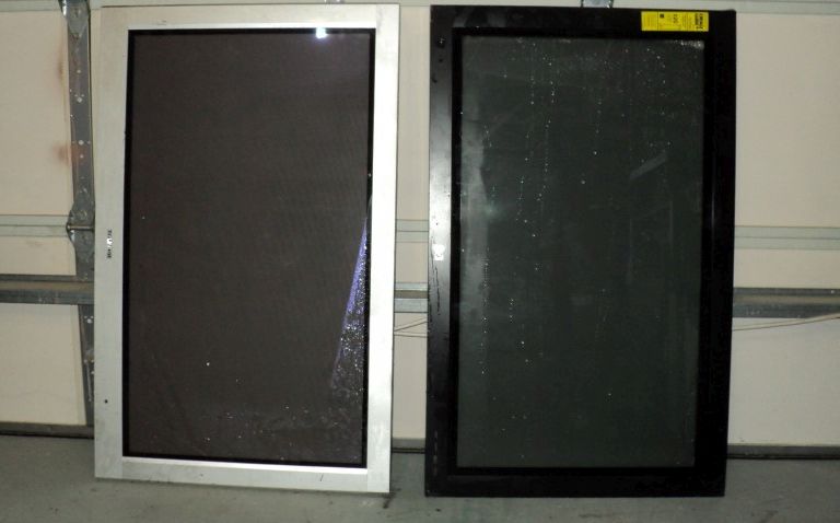 Plasma TV Pair.JPG