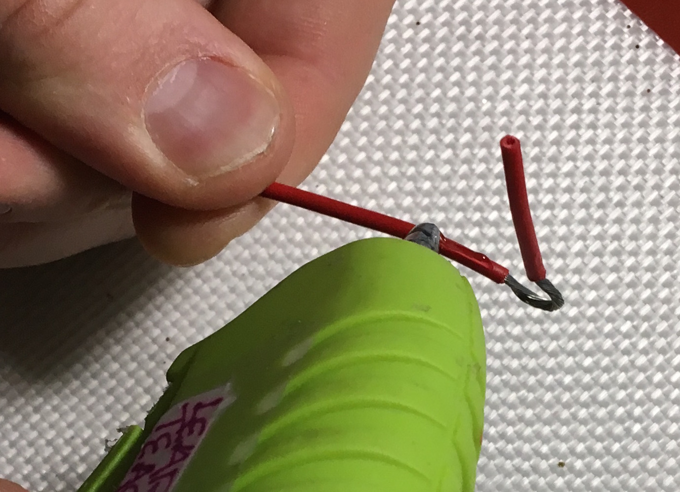 Put hot glue on wire.JPG