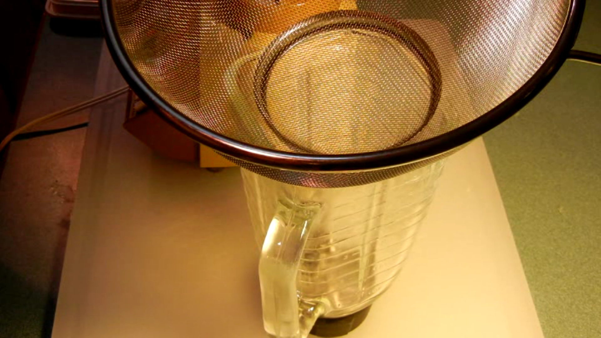 Put strainer on blender.bmp