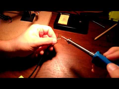 Removing insulation from tiny wires using soldering iron