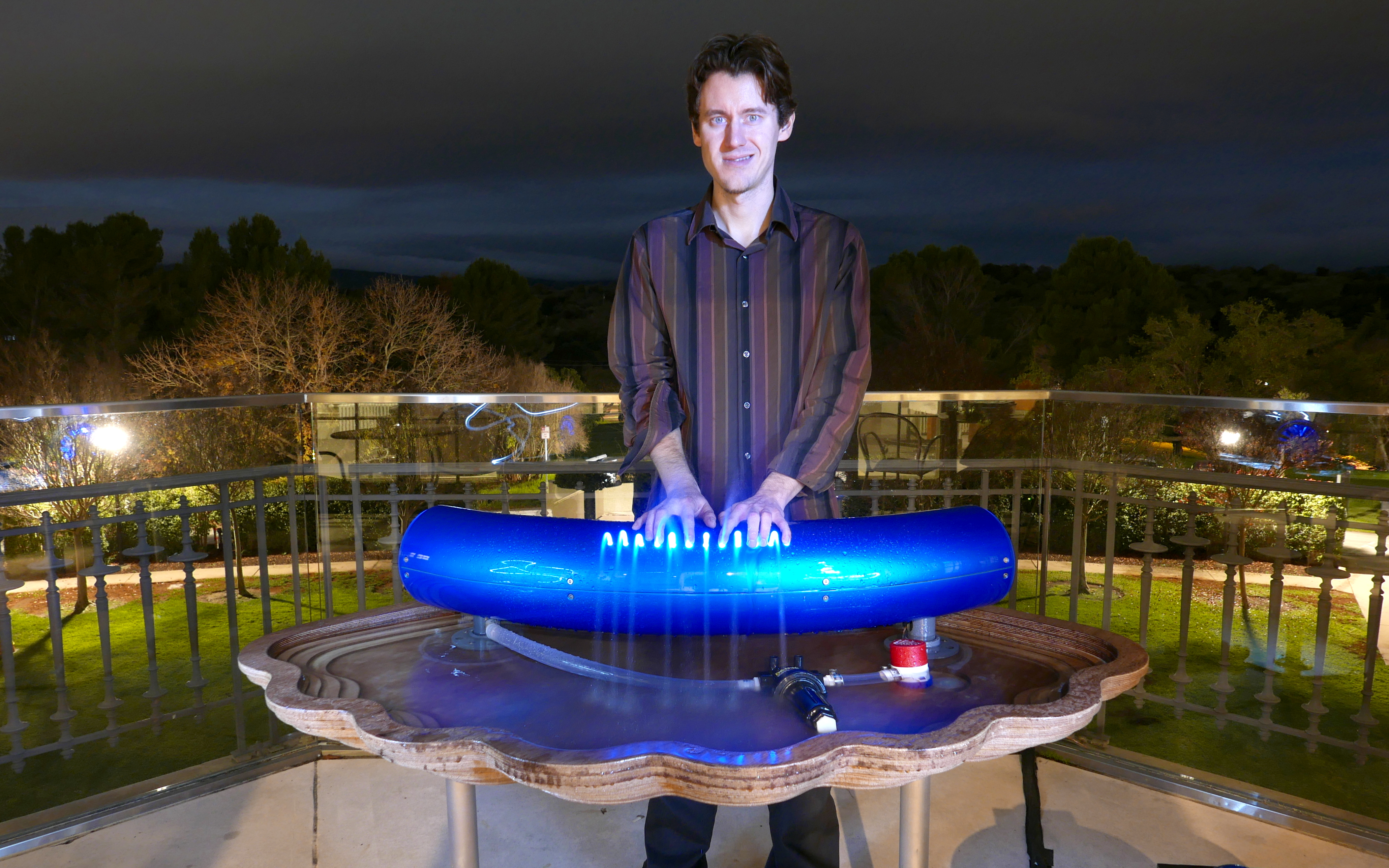 Ryan_playing_hydraulophone_rc.jpg