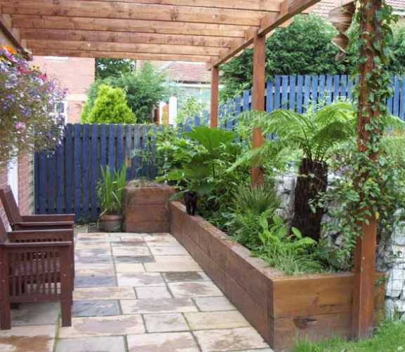 Sam &amp; Tracey's raised railway sleeper Beds_WEB.jpg