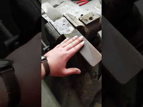Sharpening mower blade