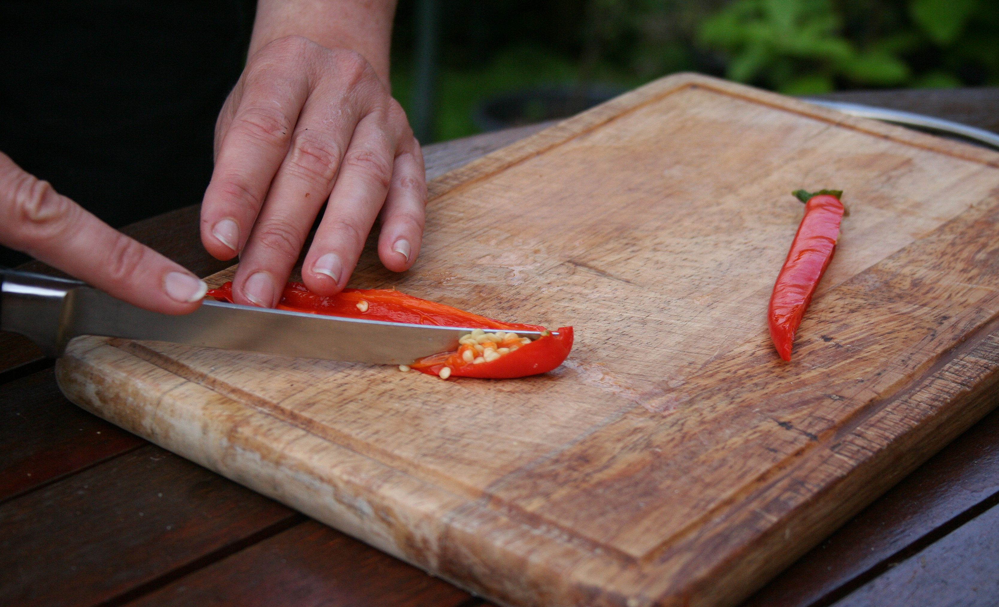 Spicy tater salad 12 - remove chilli seeds.jpg