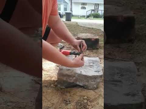 Splitting Stone with Wedge and Feather