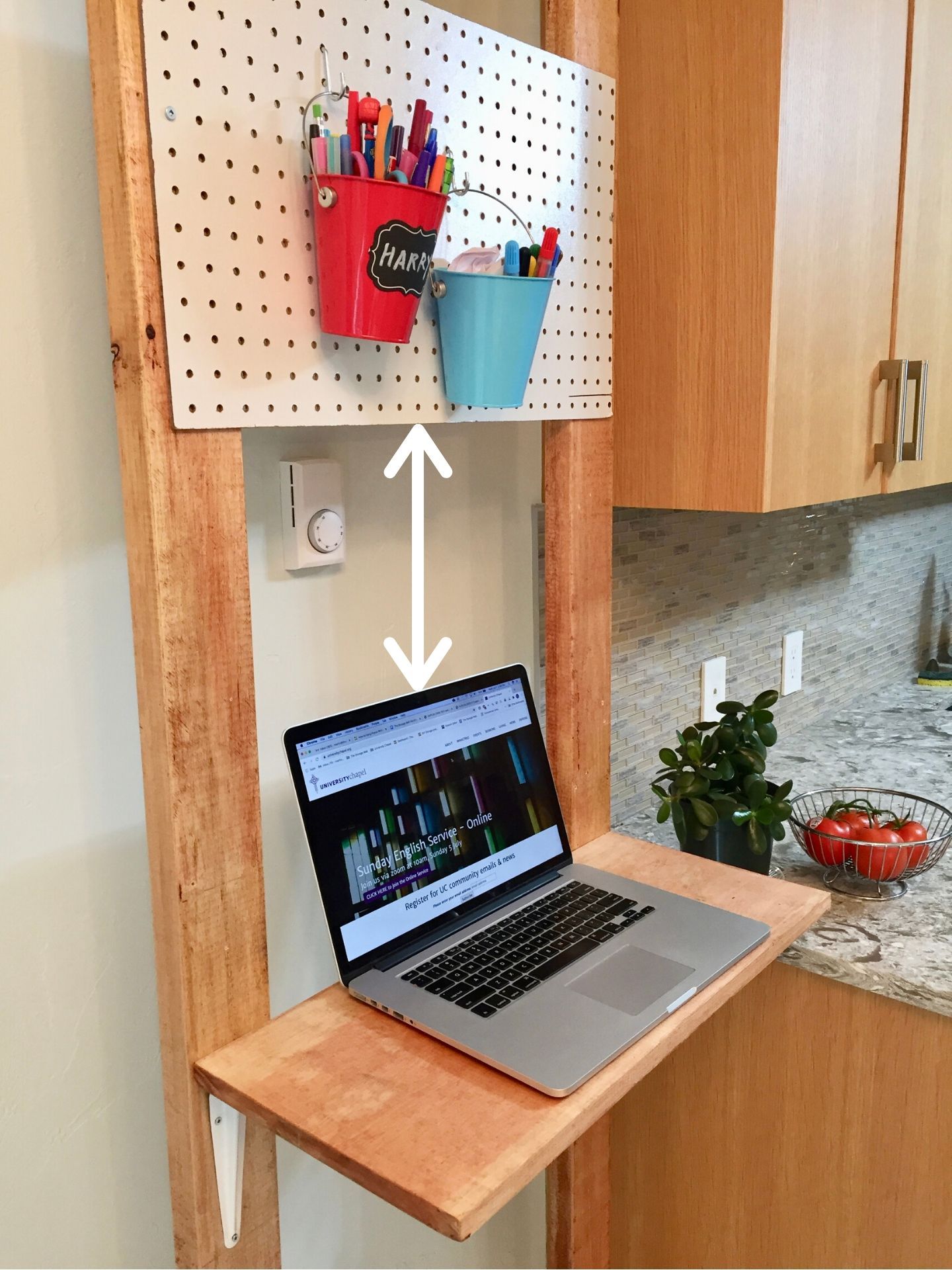 Standing desk gap between laptop and pegboard.jpg