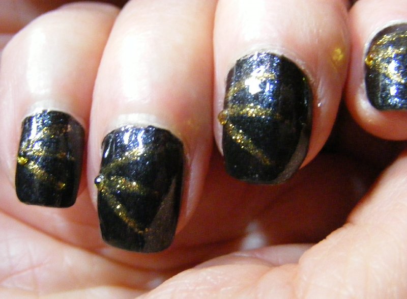 Step 8 090816 black with gold stripes and clear yellow bead b.jpg