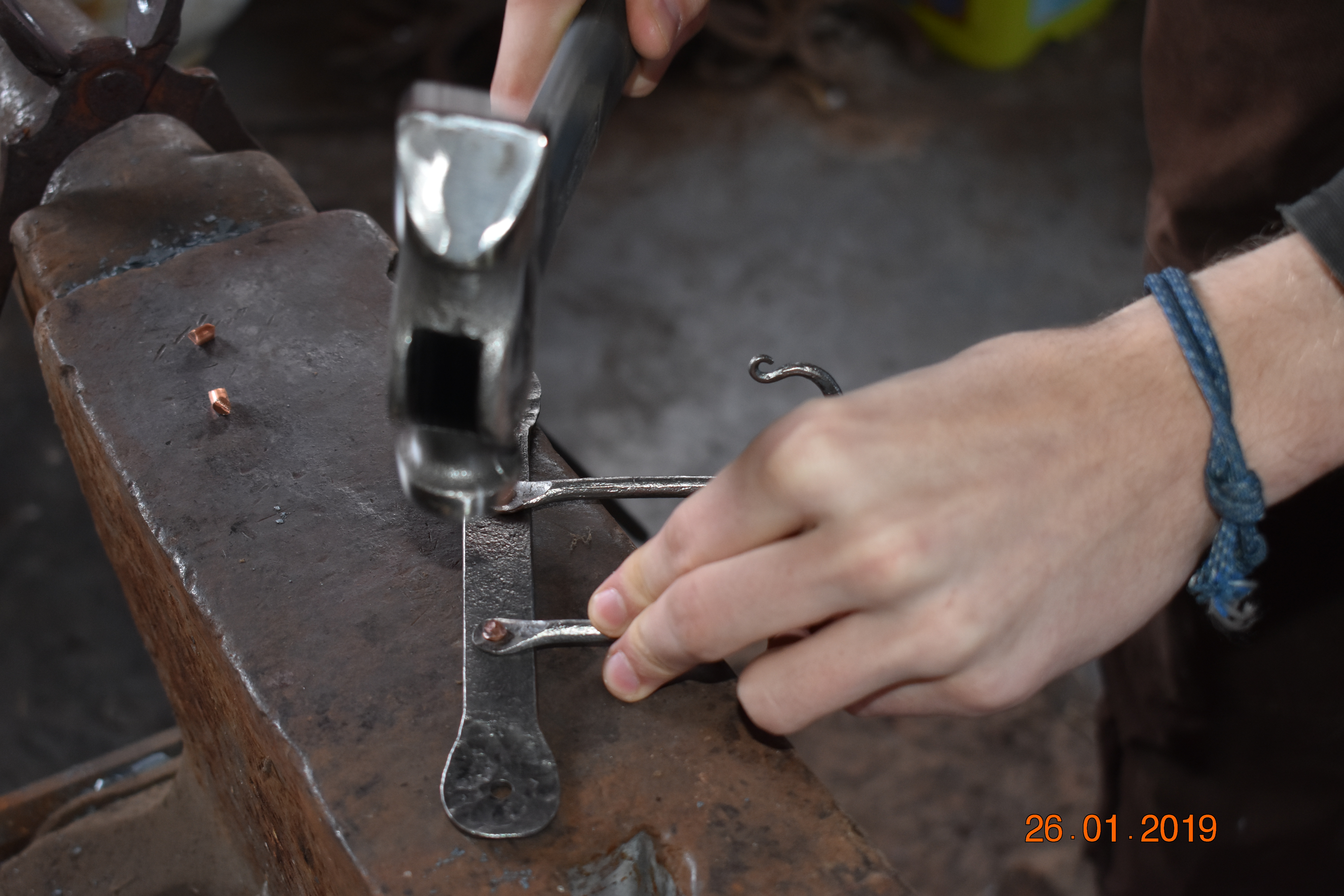 Step 8- Hammer Copper Rod.JPG