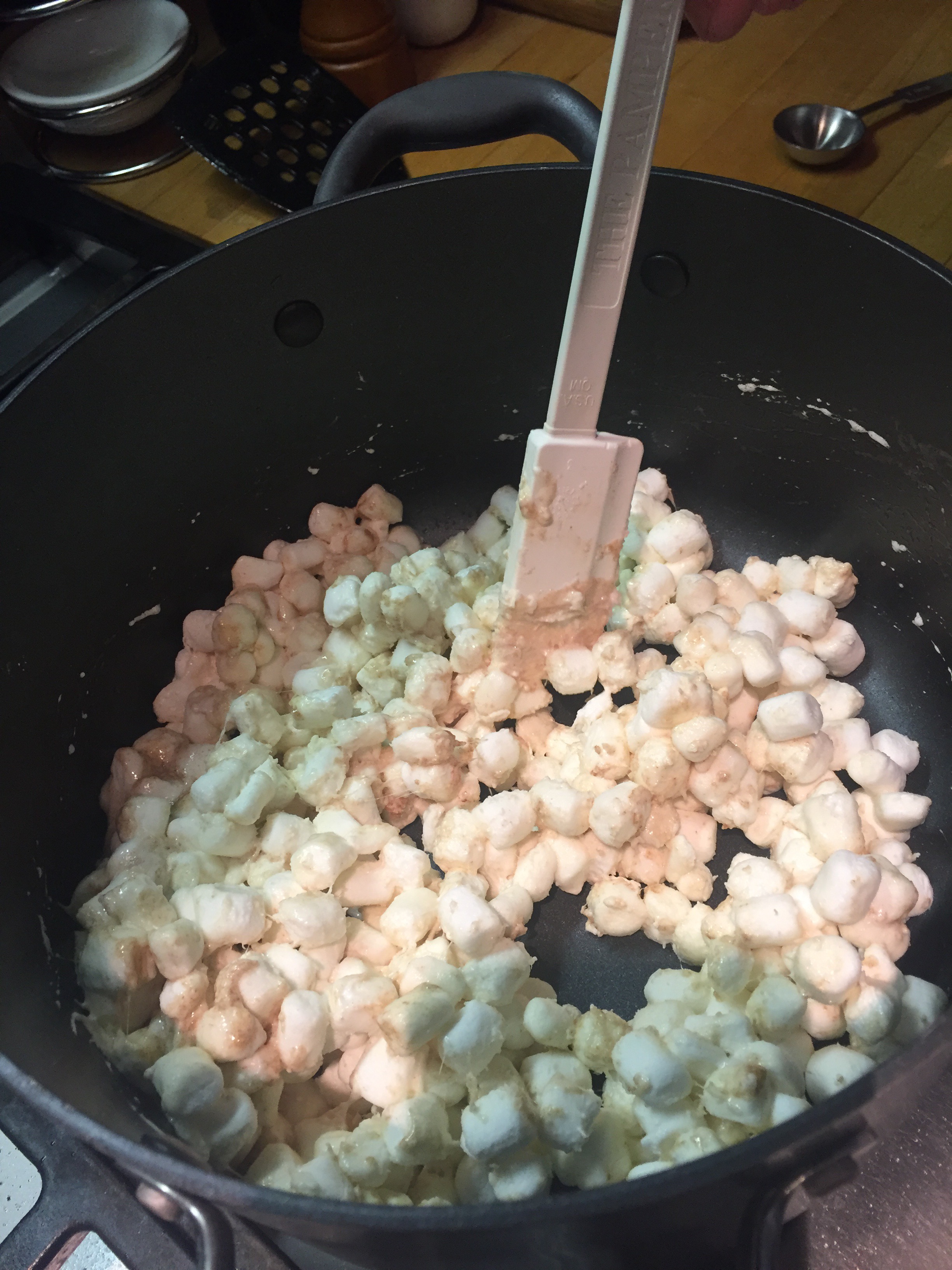 Stir 10 oz mini marshmellows into browned butter.JPG