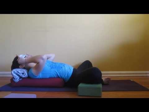 Supta Baddha Konasana (Reclined Bound Angle Pose)