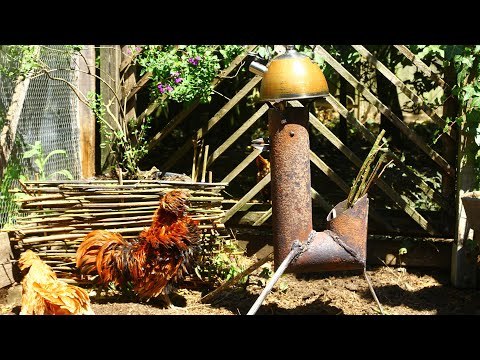 The Rooster Rocket 'J' tube rocket stove from scrap. Estufa cohete gallo Po&ecirc;le-rocket