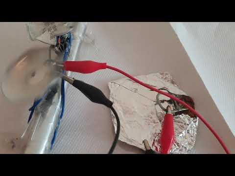 Tin Lid Battery powering motor