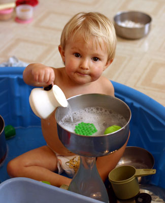 Tot Making Soup