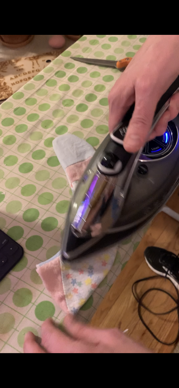 Turn tail right side out and iron.png