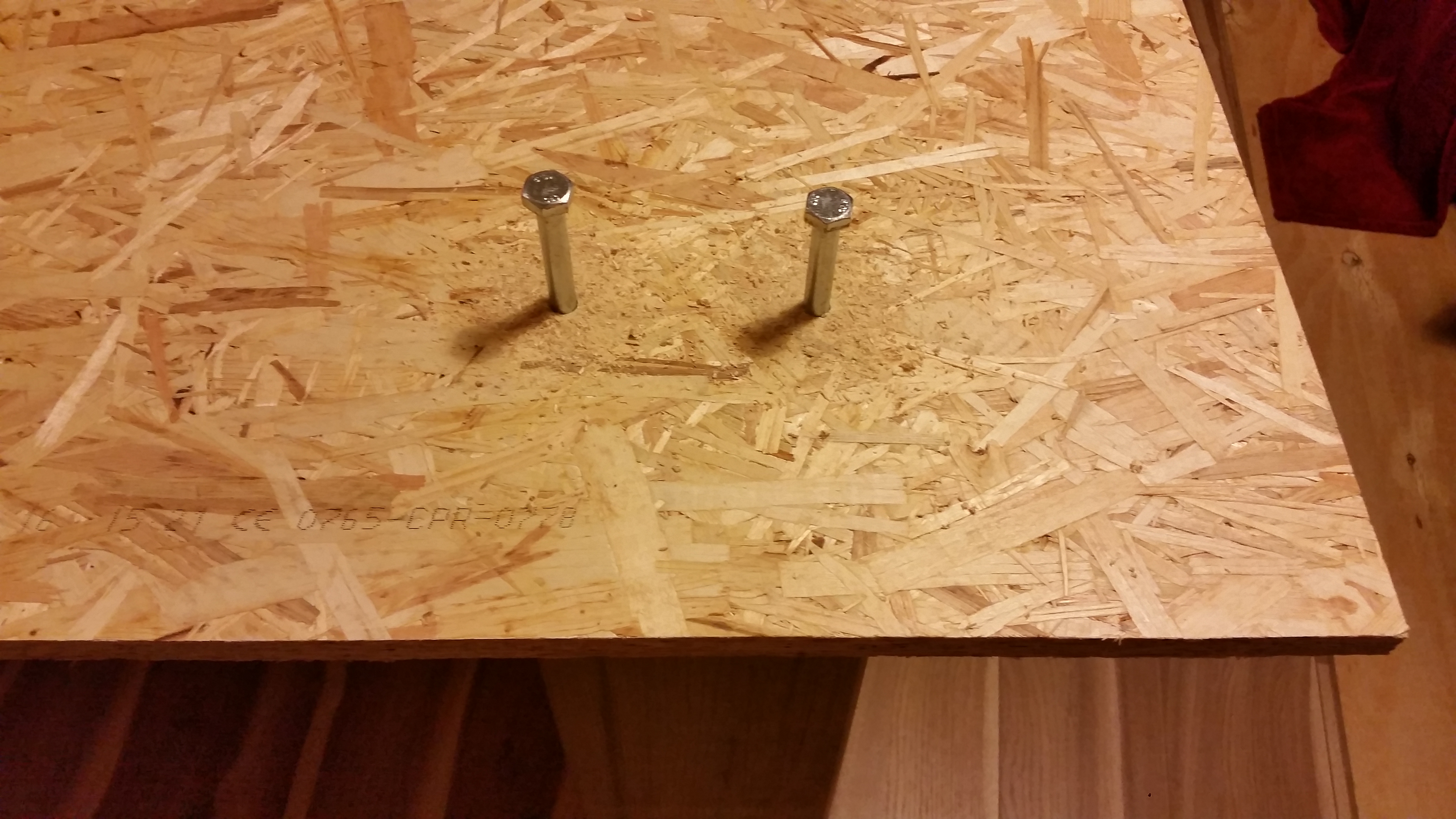 Two bolts in their holes - tracings worked!.jpg