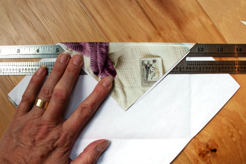 Use the ruler as a guide for the envelope folds.jpg