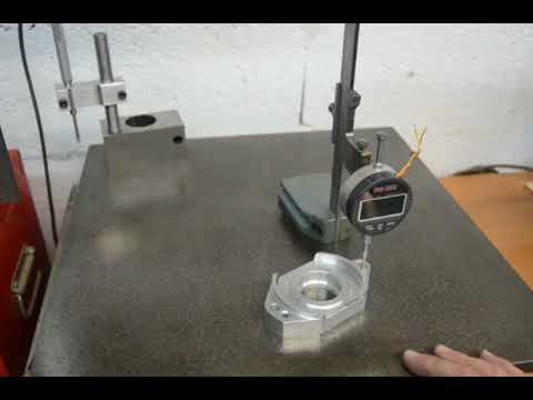 Using a dial gauge on a vernier height gauge