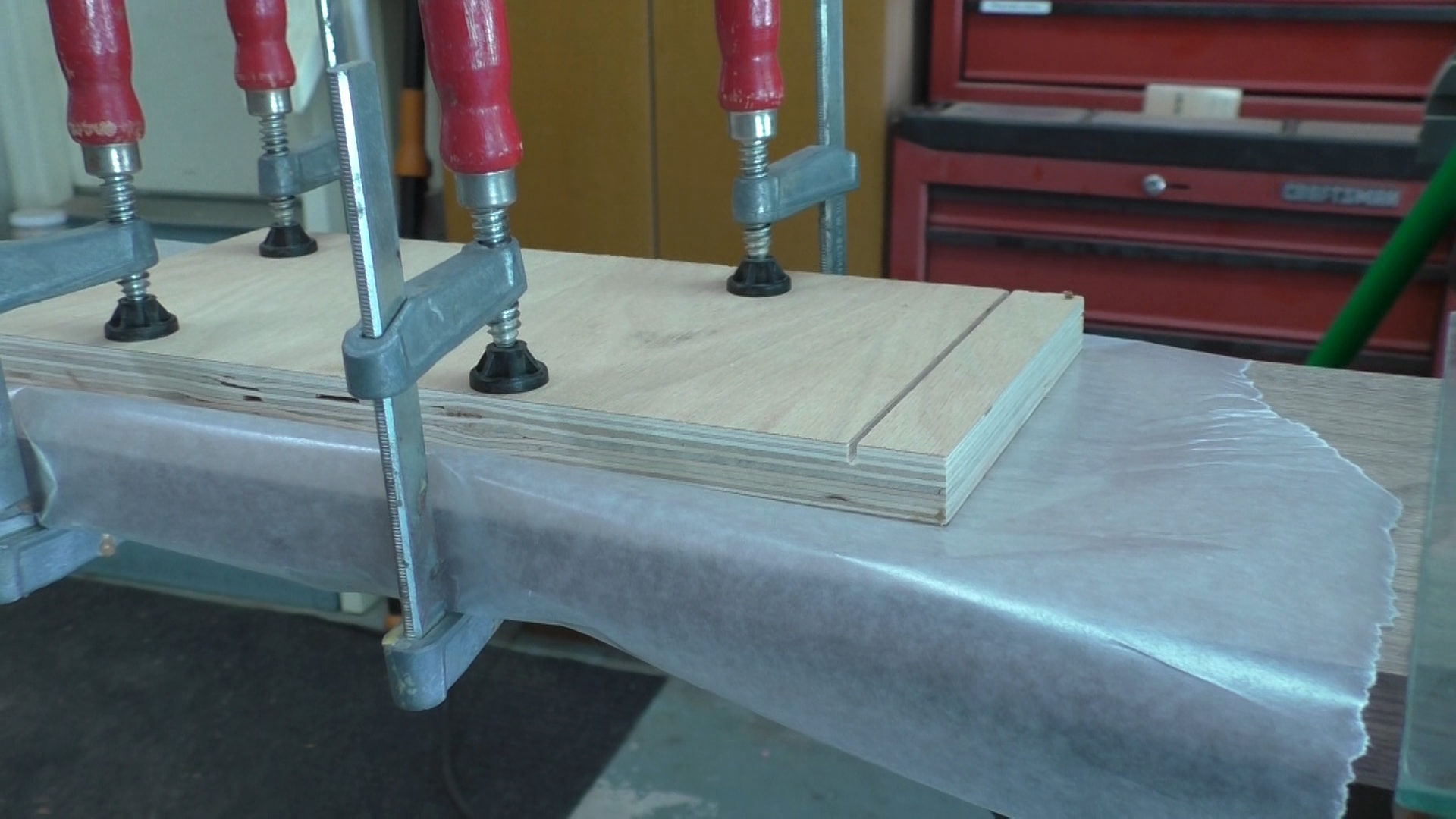 Void fill wax paper and clamp.png
