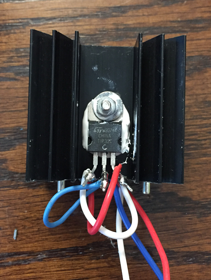Waving Robot 02 Step 01 - Attach Transistors To Heat Sink Photo 2.png