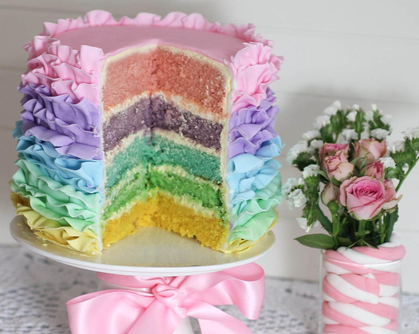 a instructables facebook rainbow pastel ruffle cake bubble and sweet slice with flower.jpg