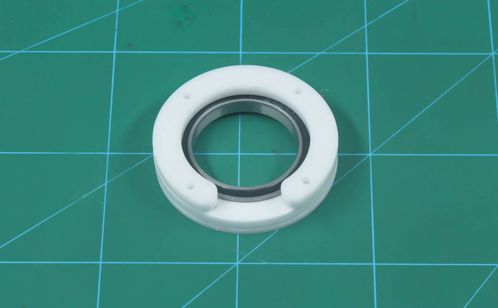 add the top outer bearing disc.jpg