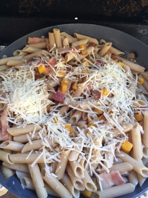 adding Pecorino chesse to Gluten Free Rigate with Roasted Butternut Squash and Smoked Bacon.JPG