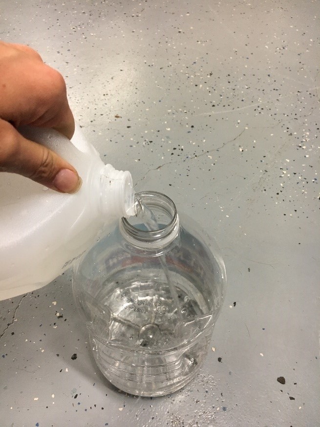 adding water to jug.jpg