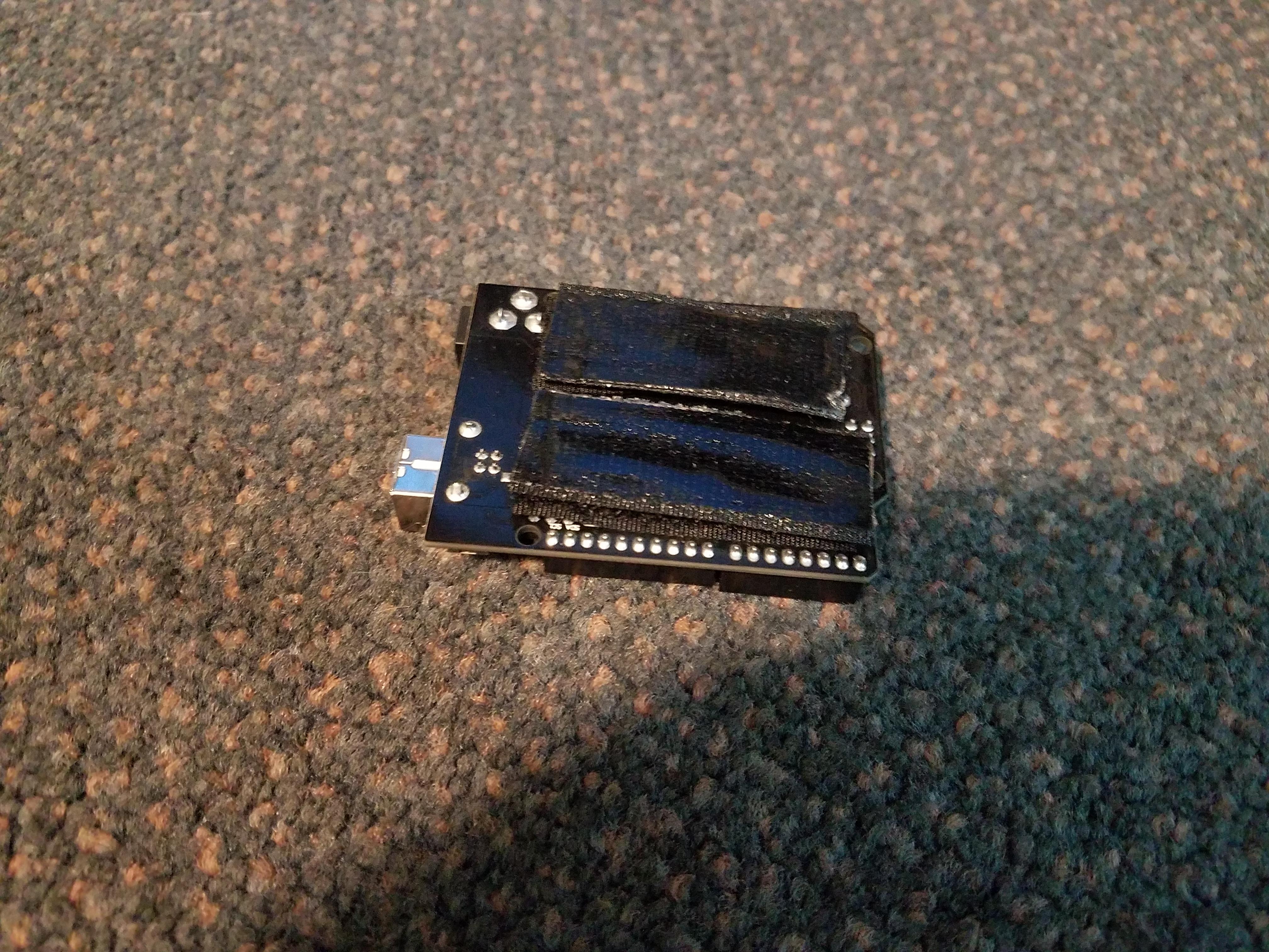 arduino with both velcro strips.jpg