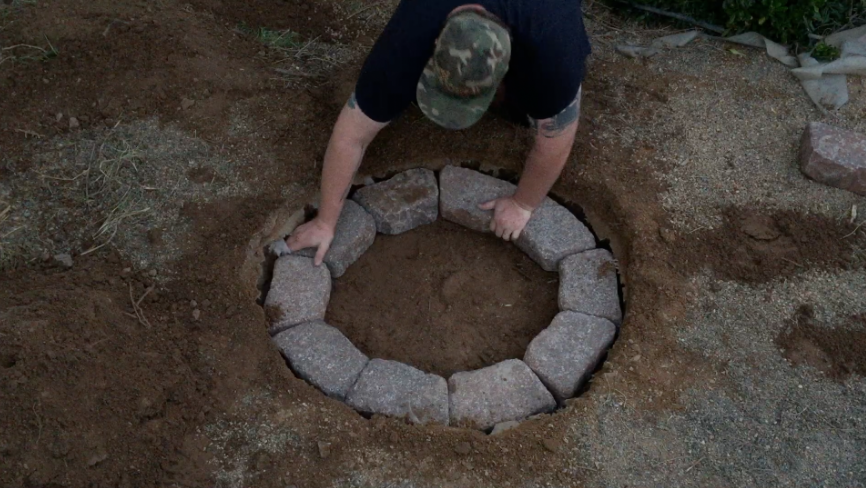 arrange stones in larger hole.png