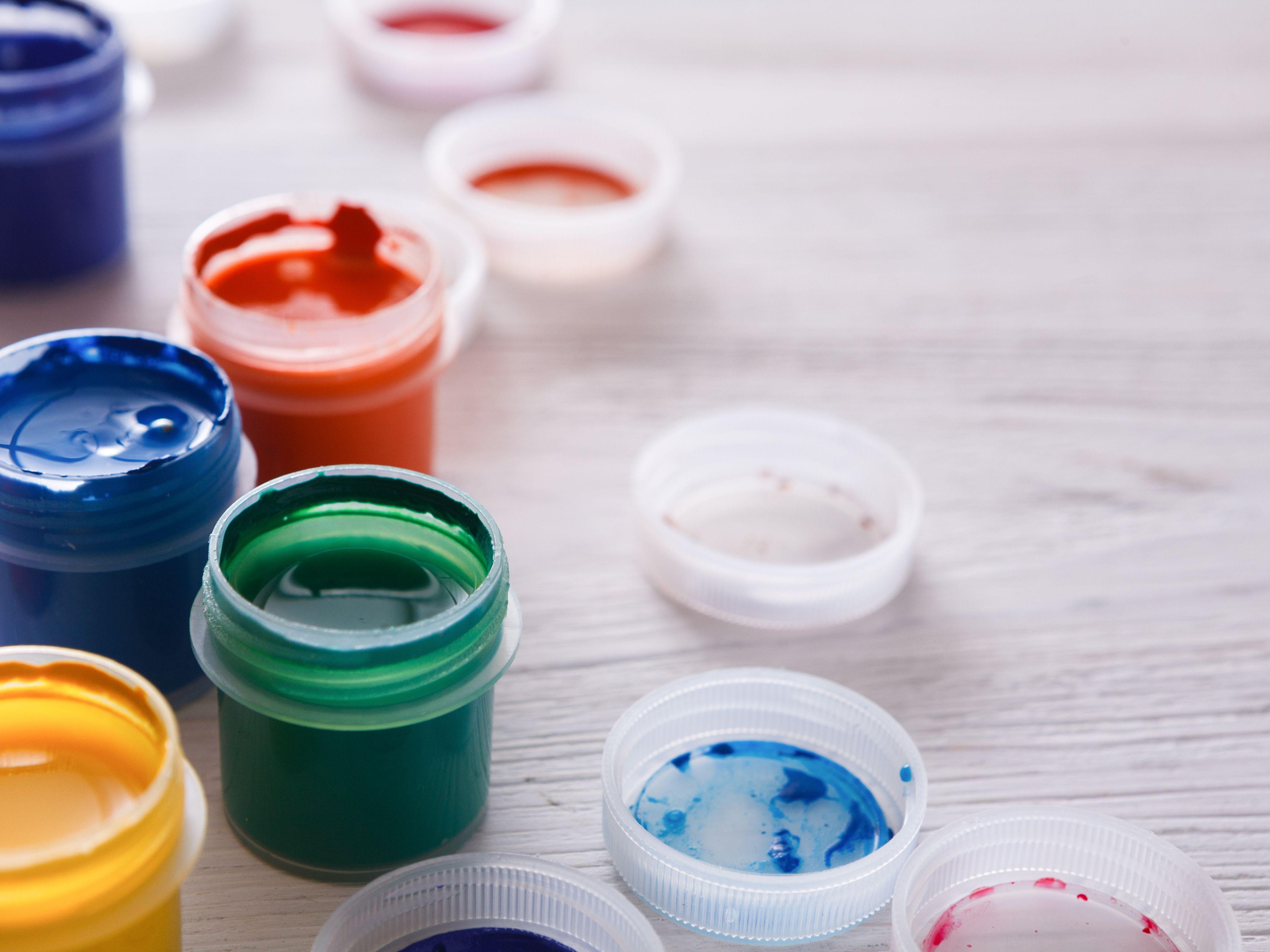 artist-workplace--set-of-color-paints-on-wood-desk-838143406-846dadeb1a2942ab871c5405a5b22fb2.jpg
