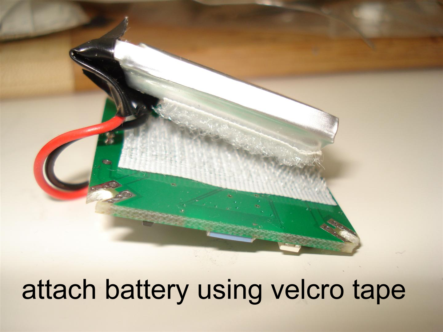 attach_qc_batt_velcro.png