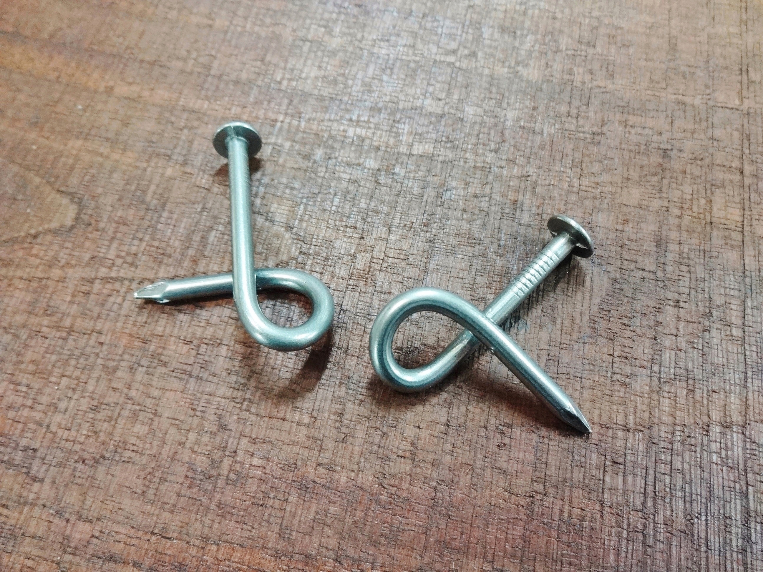 bent nail puzzle solution (1).JPG