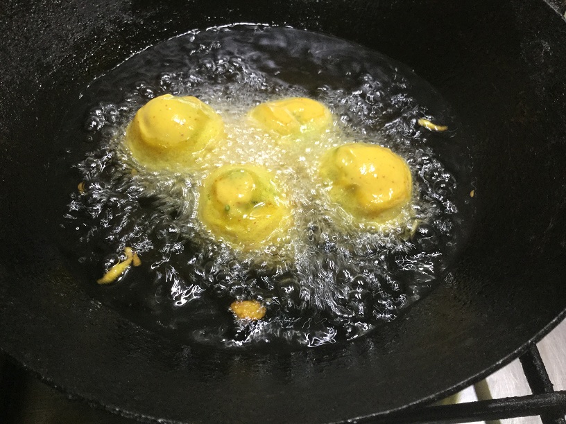 bonda in hot oil.jpg