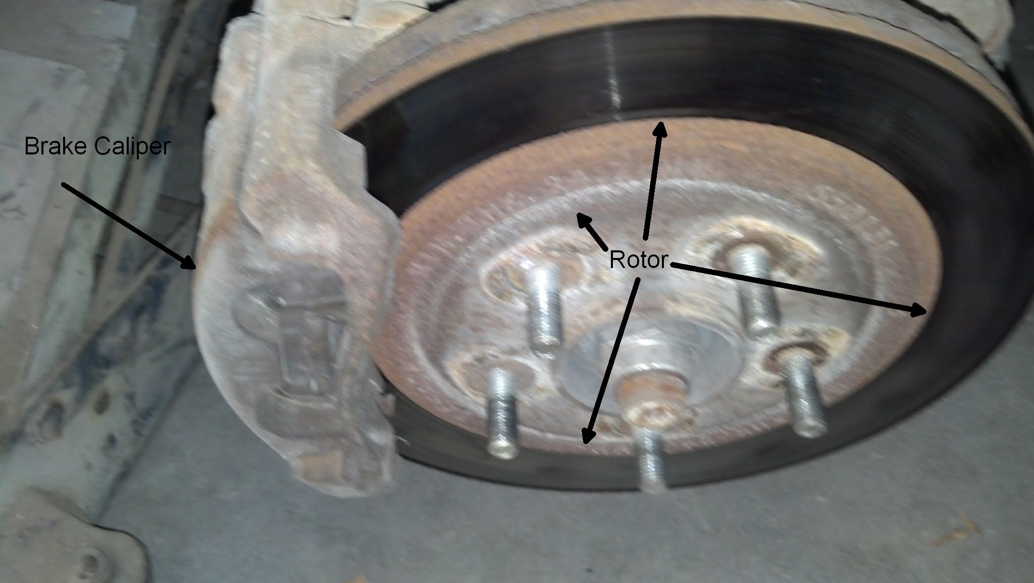 brake caliper on rotor.jpg