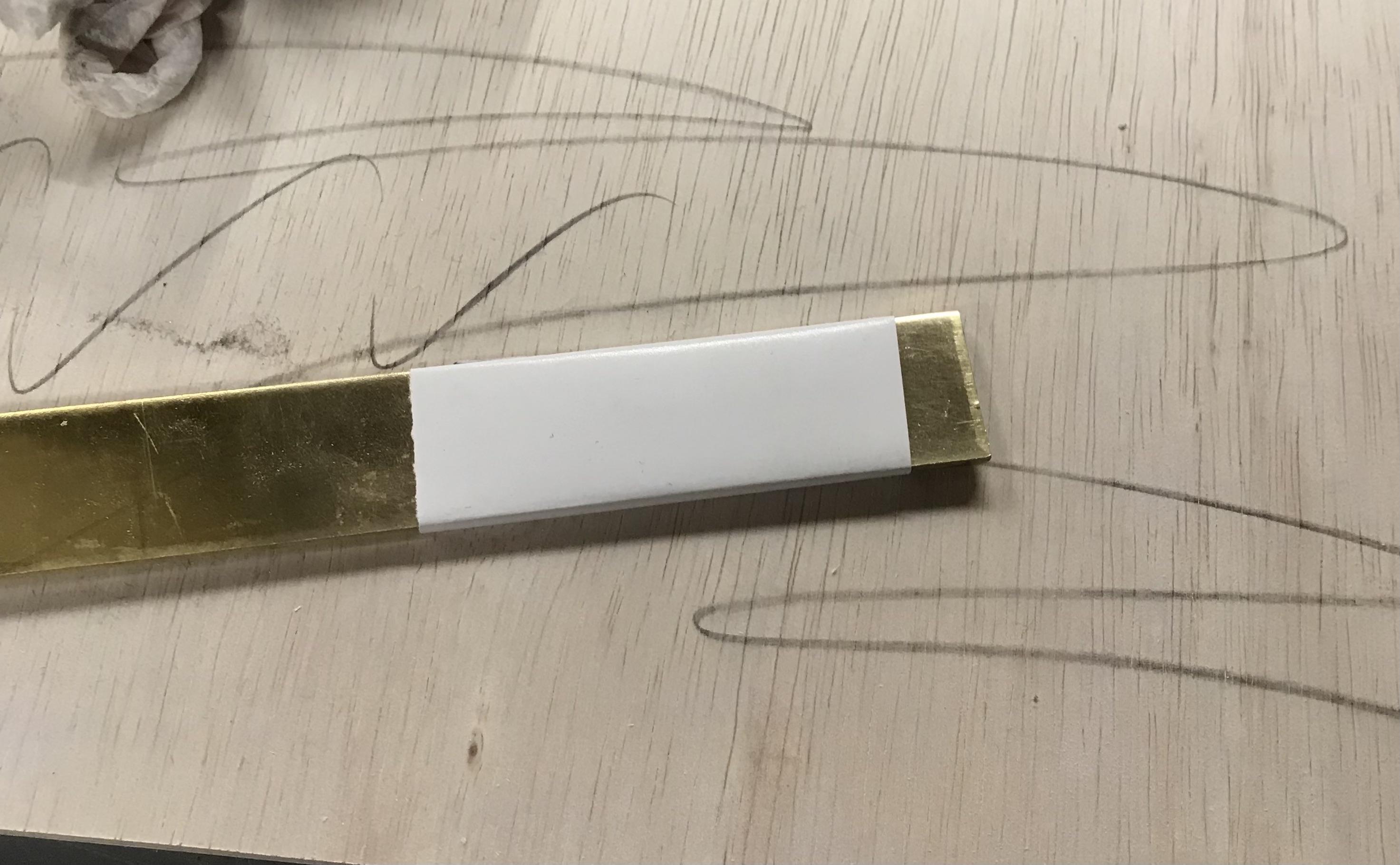 brass bar with photocopy.jpg