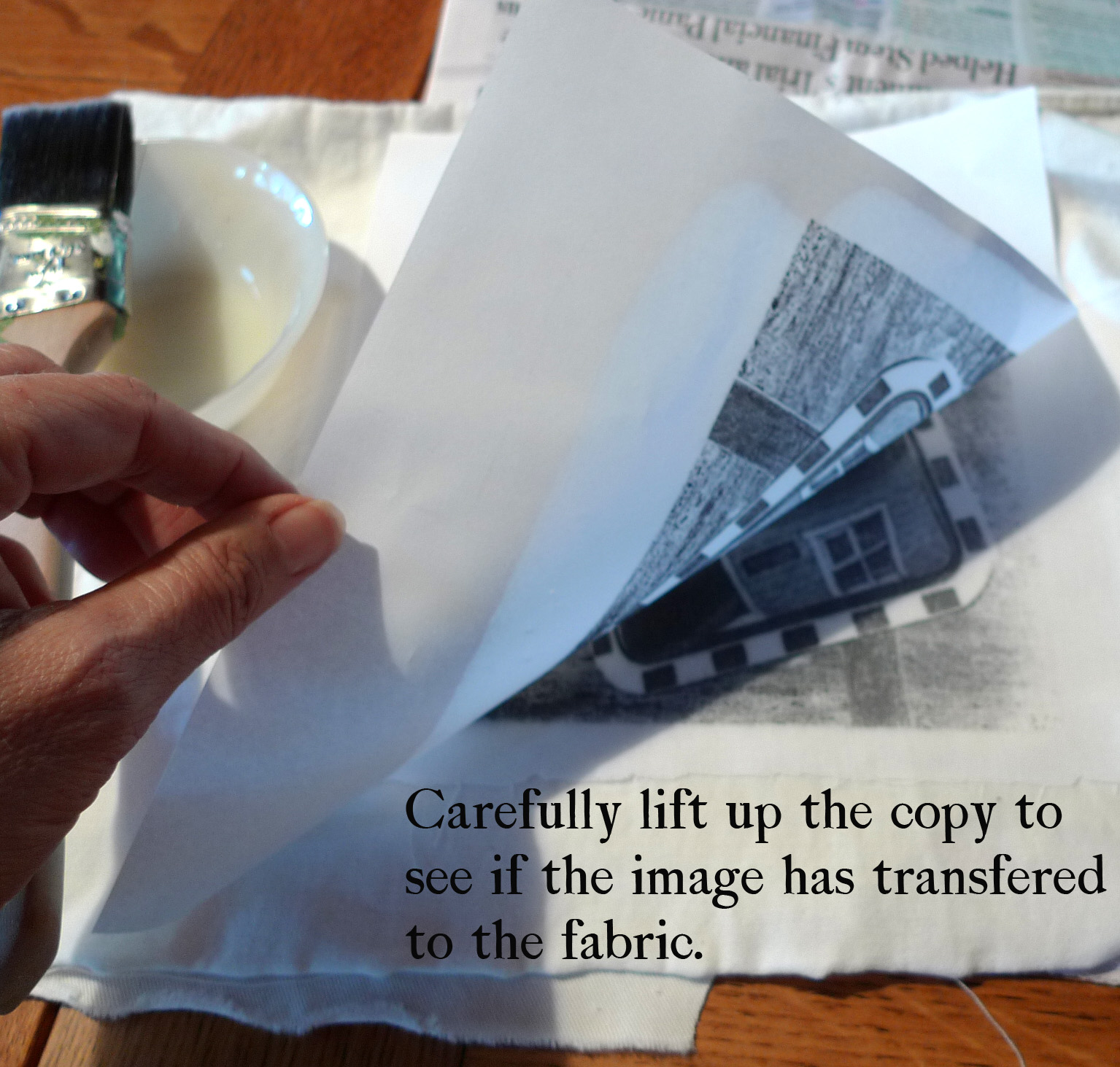 carefully lift up the paper.jpg